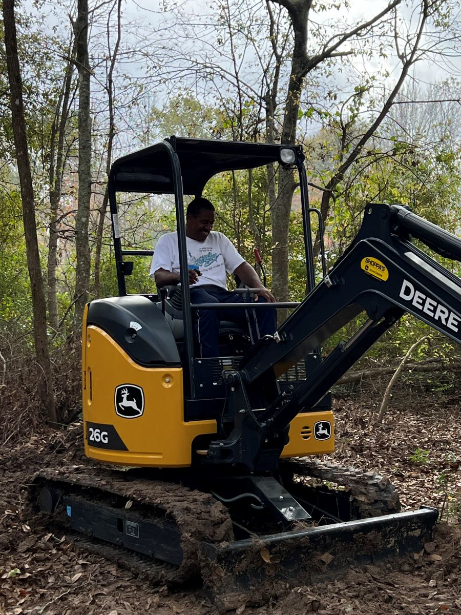 During our mini-excavator training. Mayor Gilmore is now certified to operate our new mini-excavator.